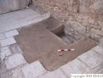 L_V16u1008 A10v301 N809 jl x vk50 stones visible in context NOTE backfill on plastic on floor